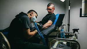 Tattoo-Artist,-Tattoo-Machines,-Needles,-Foot-Pedal-and-Utilities